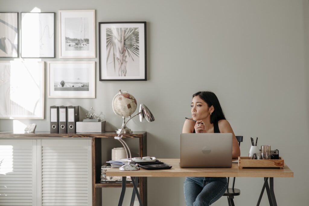 A woman looking concerned in an office