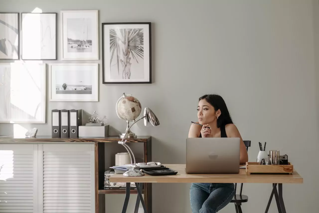 A woman looking concerned in an office