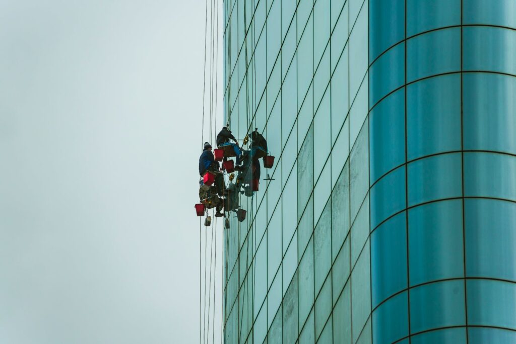 Workers cleaning high-rise windows