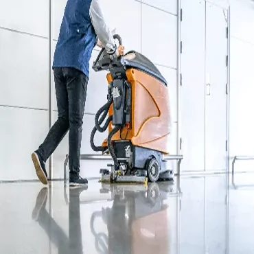 A janitor prepares for commercial cleaning