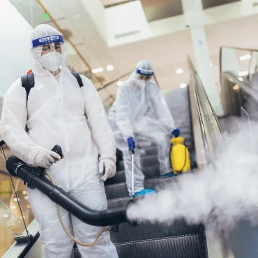 A team of commercial disinfection specialists at work