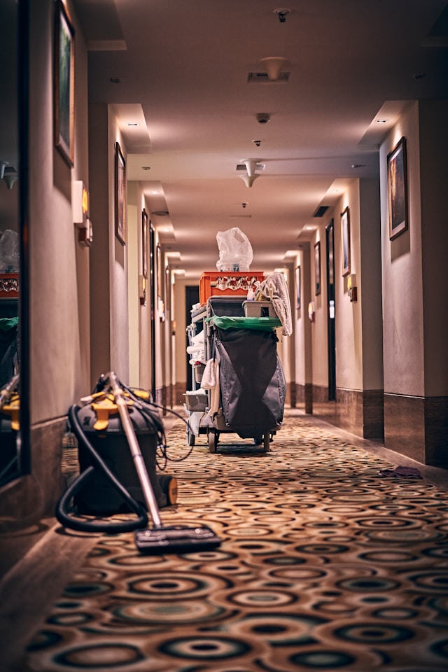 Cleaning cart in hotel hallway