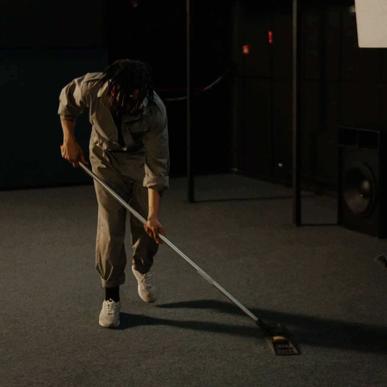 Professional worker cleaning the floor