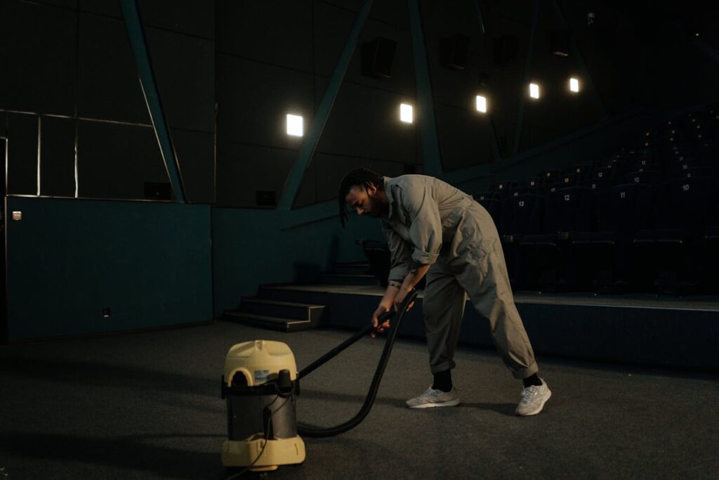 Worker cleaning a large commercial floor